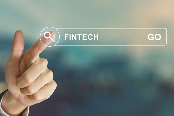 Stock image of hand pointing to the word Fintech in a search bar